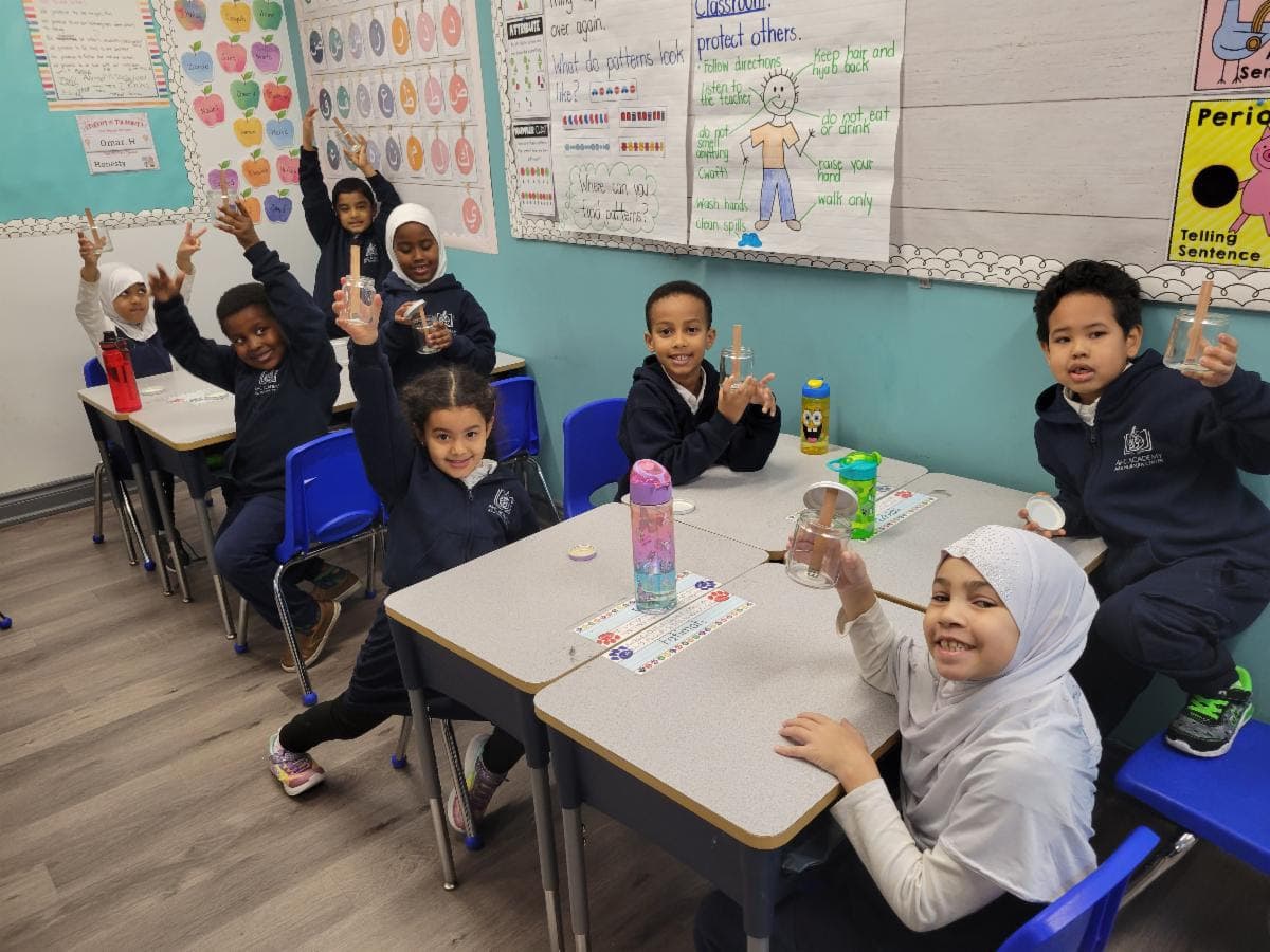 Children participating in Quran education at Abu Huraira Center